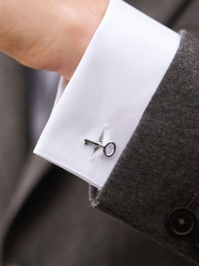 Bouton de manchette clef