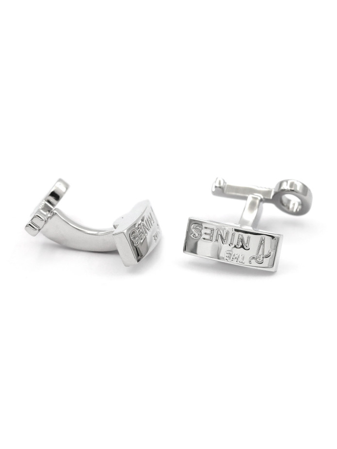 Bouton de manchette clef