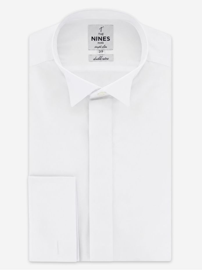 Camicia con polsini doppi bianca collo cutaway a abbottonatura nascosta