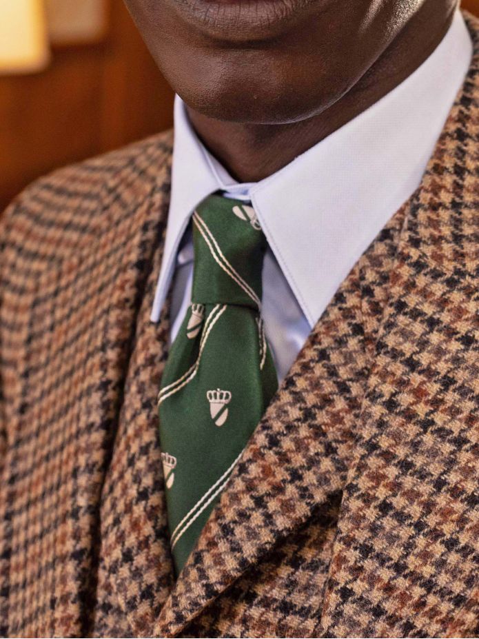 Cravatta di seta verde con motivi a stemma