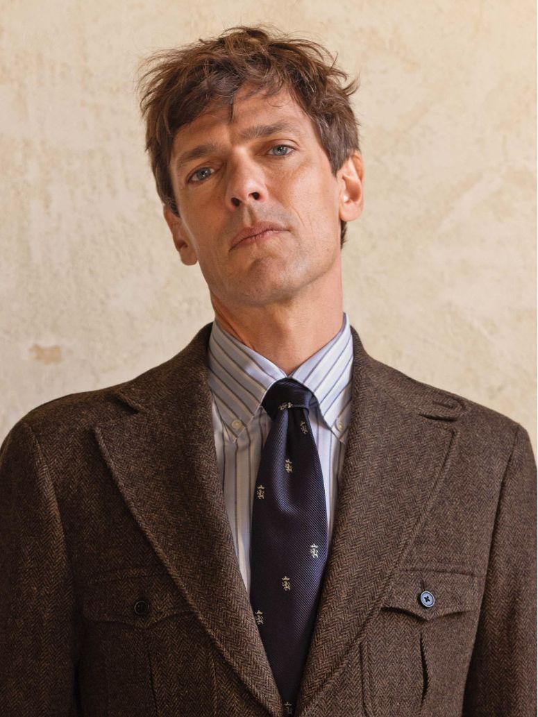 Cravatta in seta blu navy con motivi a leone
